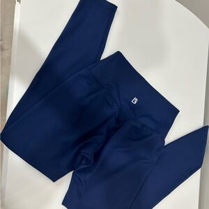 NEVER WORN. Blue BuffBunny 7/8 pants. Size medium.